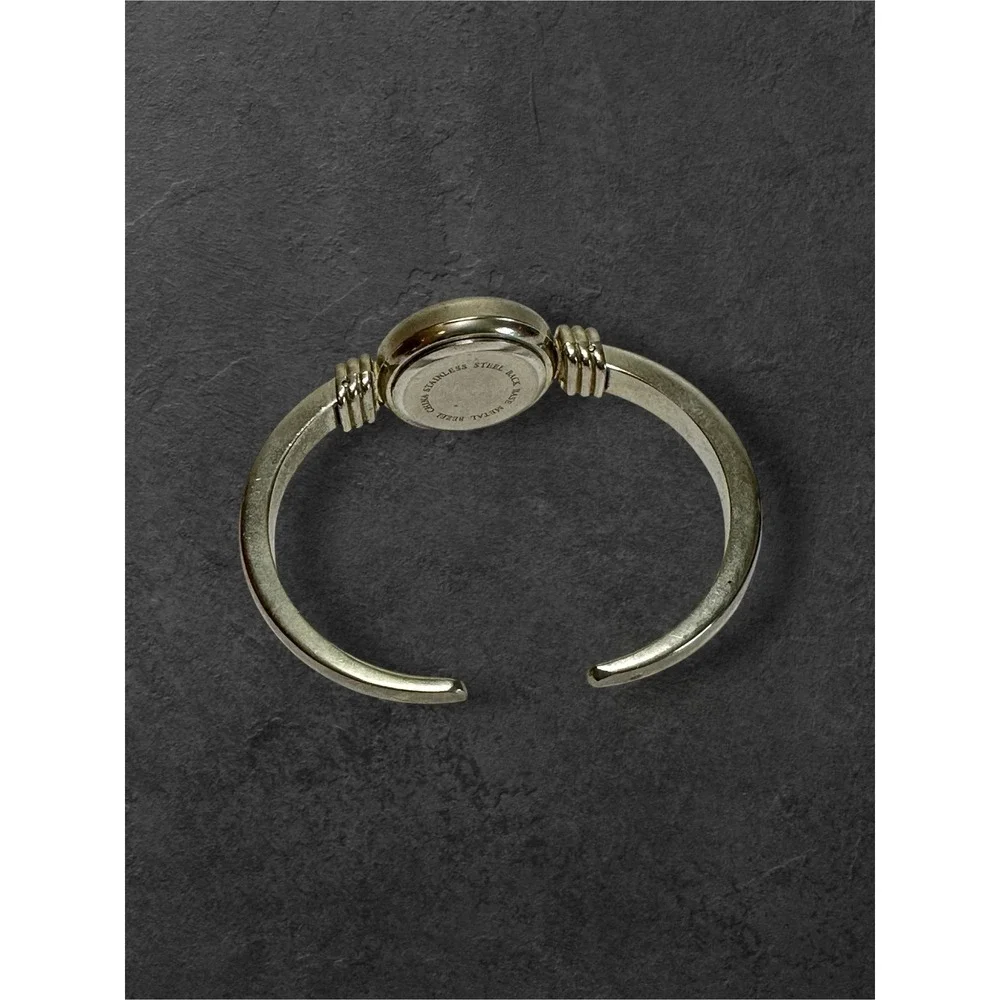 Snowflake Cuff Watch Womens Silver Tone Vintage Quartz Bangle